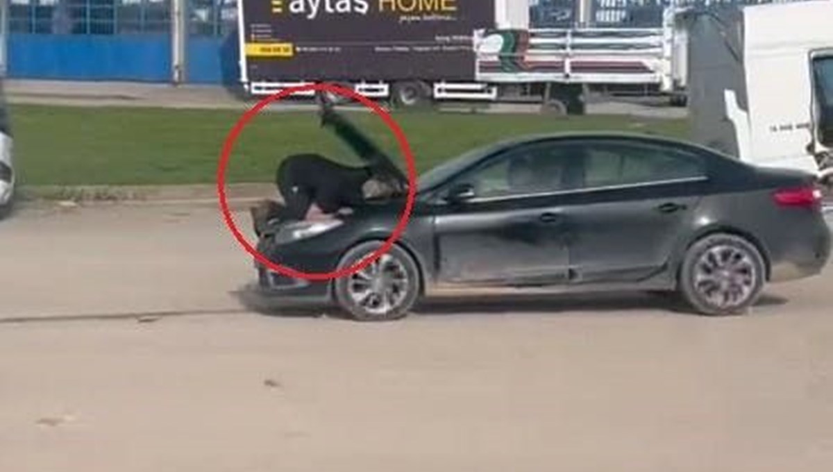 Seyir halindeyken kaputa çıkarak motoru tamir etti